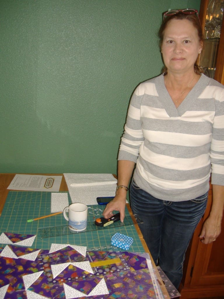 Mary with completed flying geese blocks.