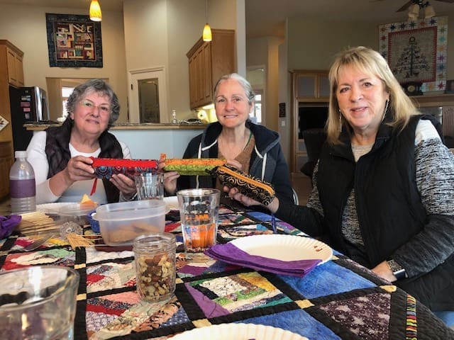 Rosenelle, Kelly &amp; Sue show off their pencil cases.